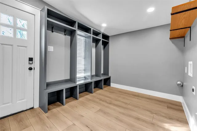 a view of room with window and hardwood