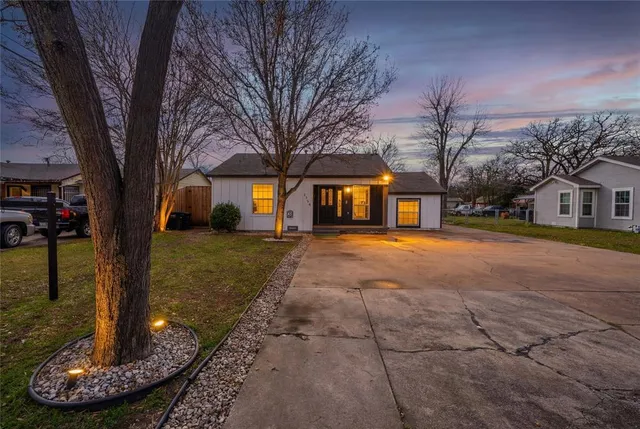 a house with trees in front of it