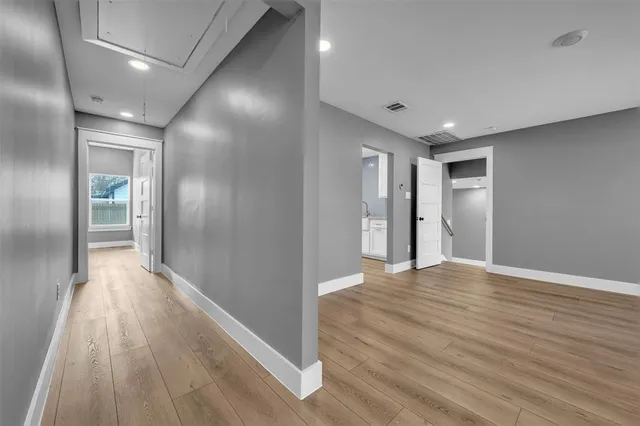 a view of a livingroom with wooden floor