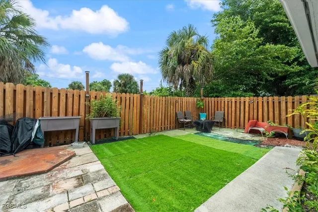 a garden view with a seating space