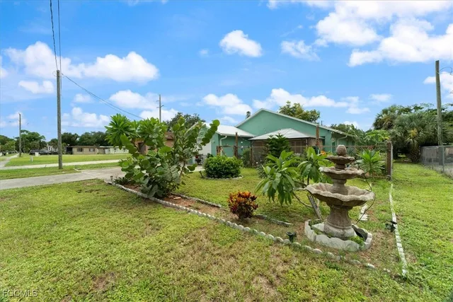 a view of a golf course with a lake