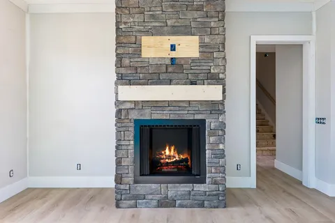 a living room with a fireplace