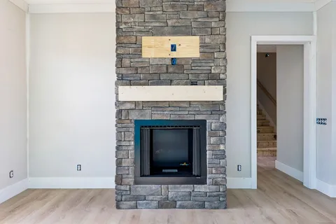 a living room with a fireplace