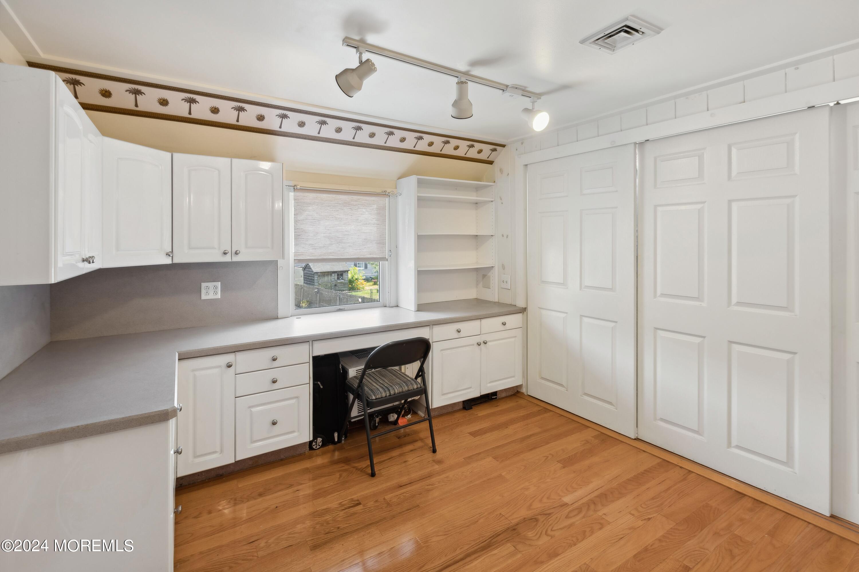 1119 Sampson Road Point Pleasant, NJ 08742 - Photo 17 of 29 a kitchen with a sink cabinets and window