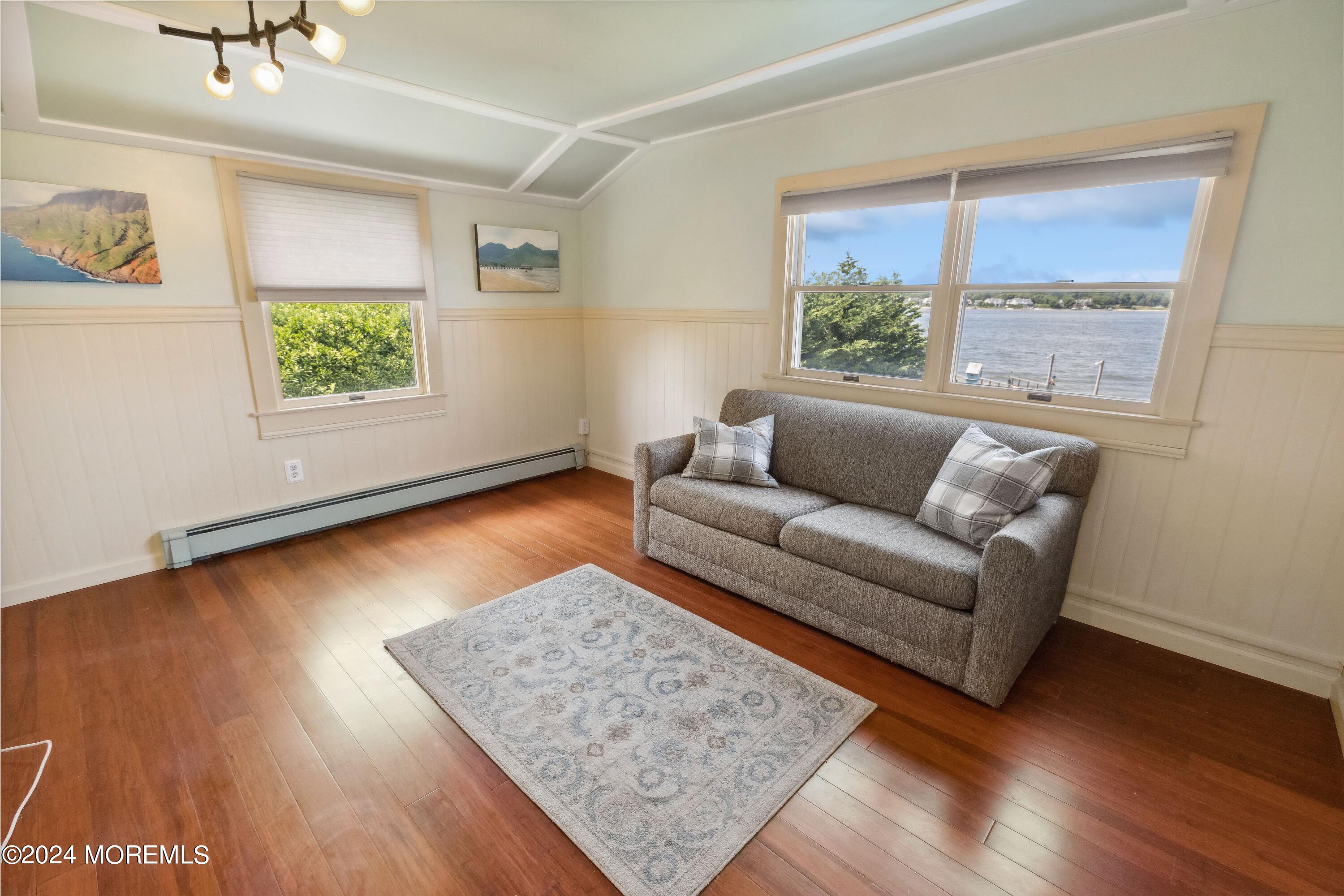 1119 Sampson Road Point Pleasant, NJ 08742 - Photo 19 of 29 a living room with couch and a window