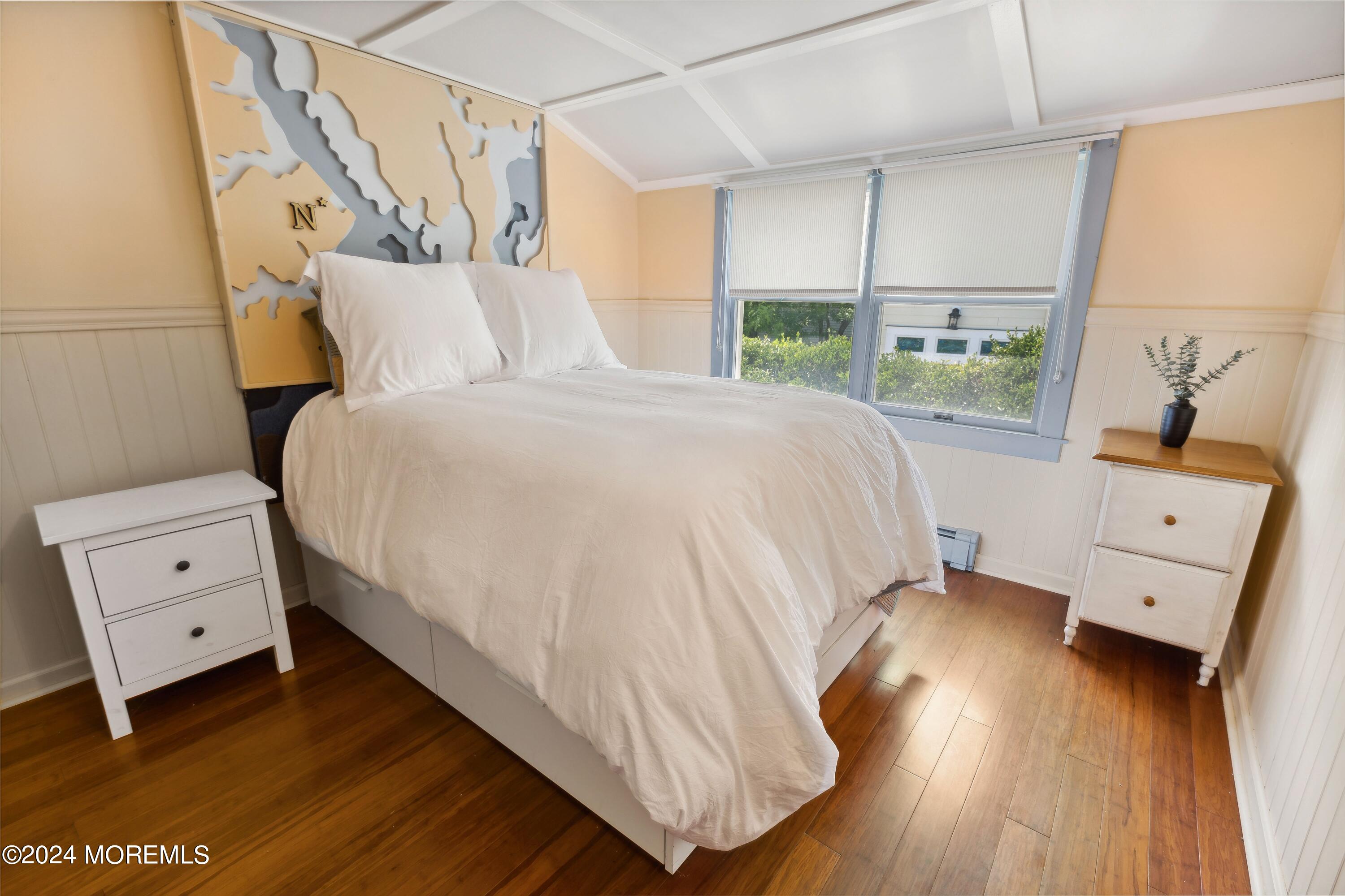 1119 Sampson Road Point Pleasant, NJ 08742 - Photo 20 of 29 a bedroom with a bed and a window