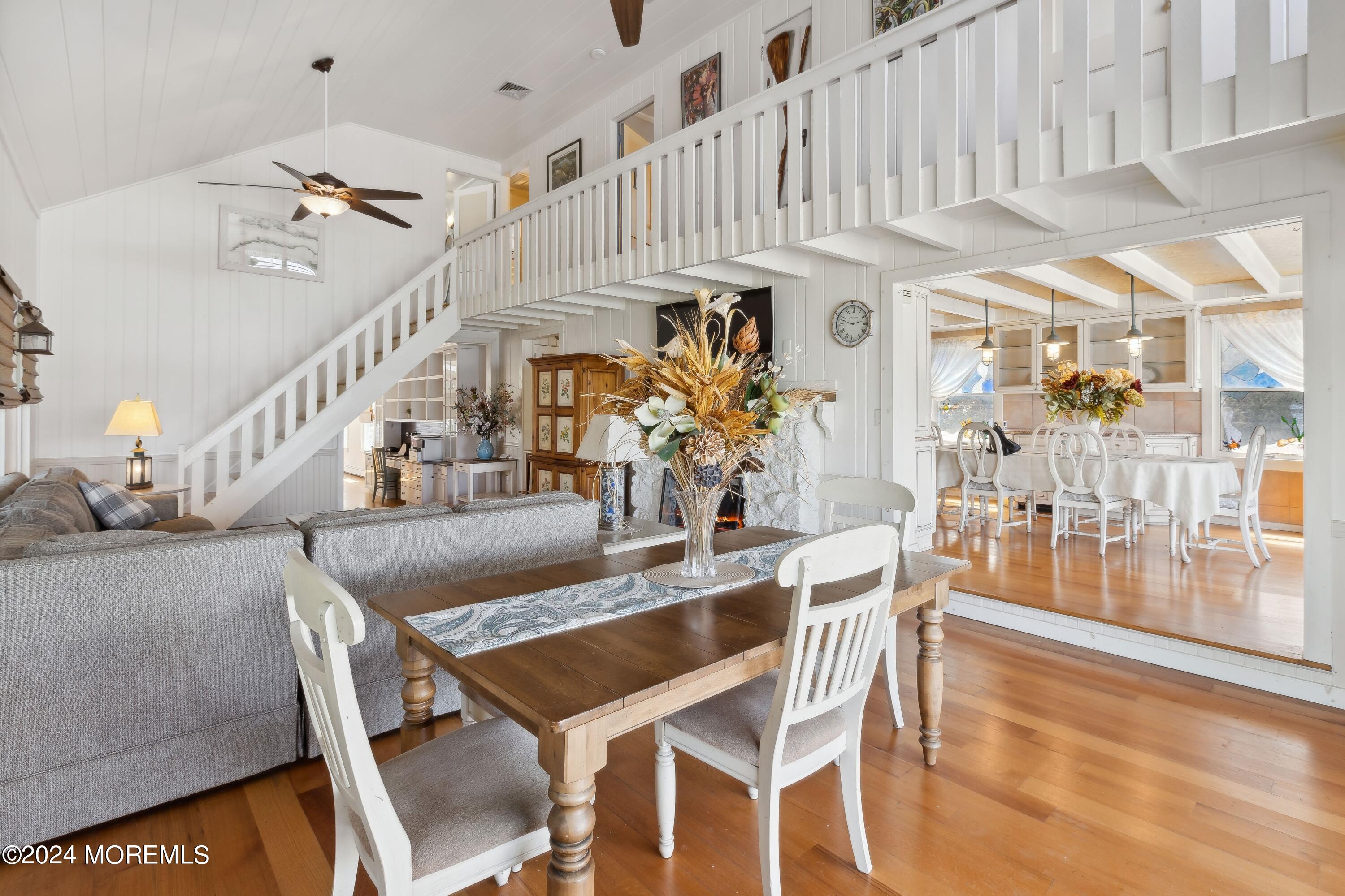 1119 Sampson Road Point Pleasant, NJ 08742 - Photo 7 of 29 a view of a dining room with furniture and a chandelier