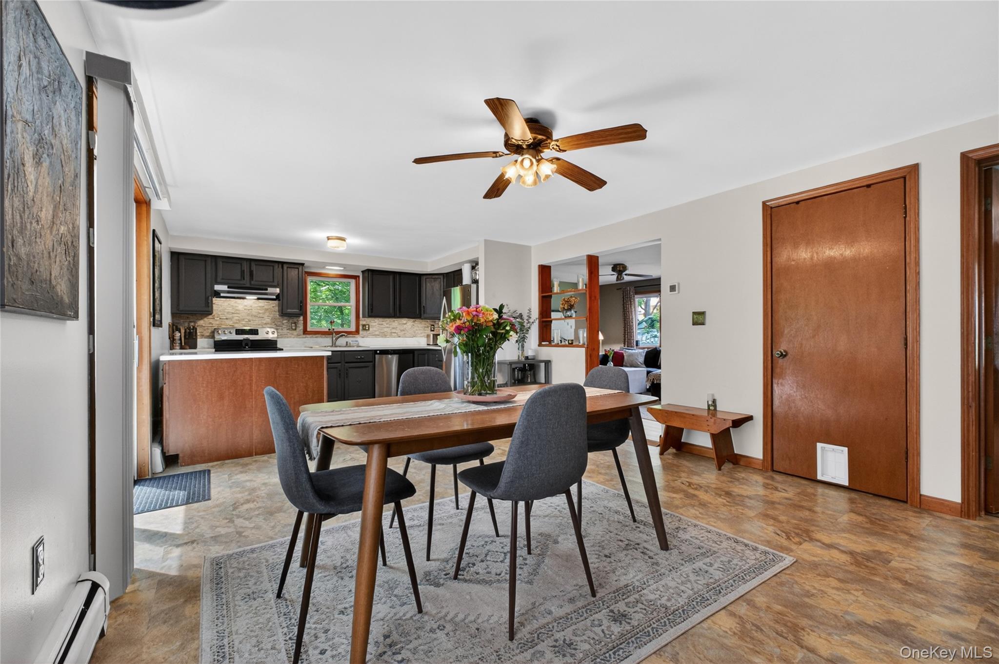 127 Belvedere Road Beacon, NY 12508 - Photo 12 of 37 a view of a dining room with furniture and a chandelier