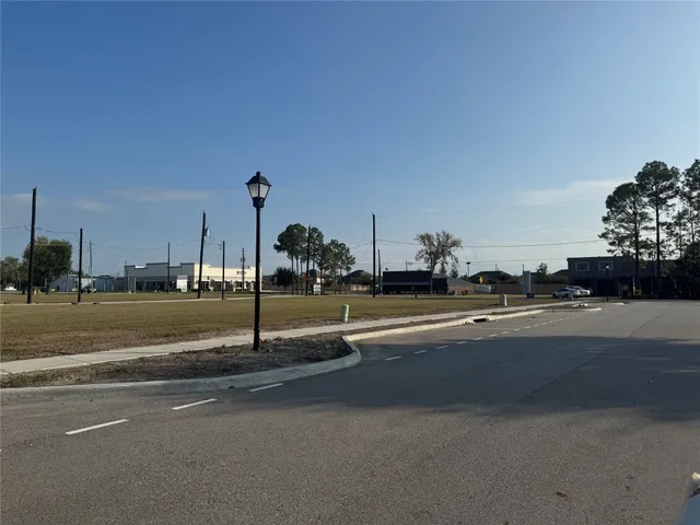 a view of a building with a street