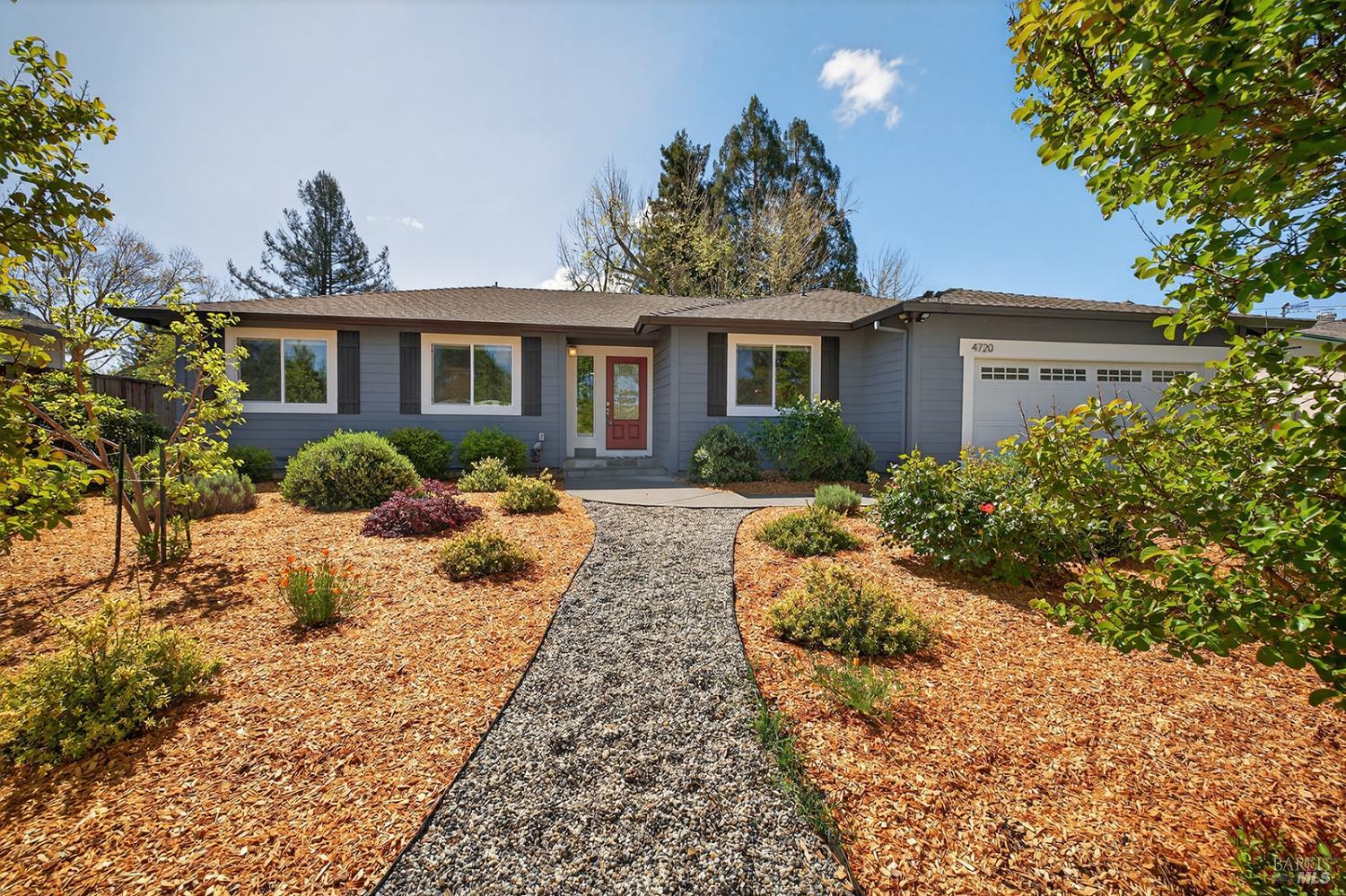 4720 Granada Drive Santa Rosa, CA 95409 - Photo 1 of 68 a front view of a house with garden