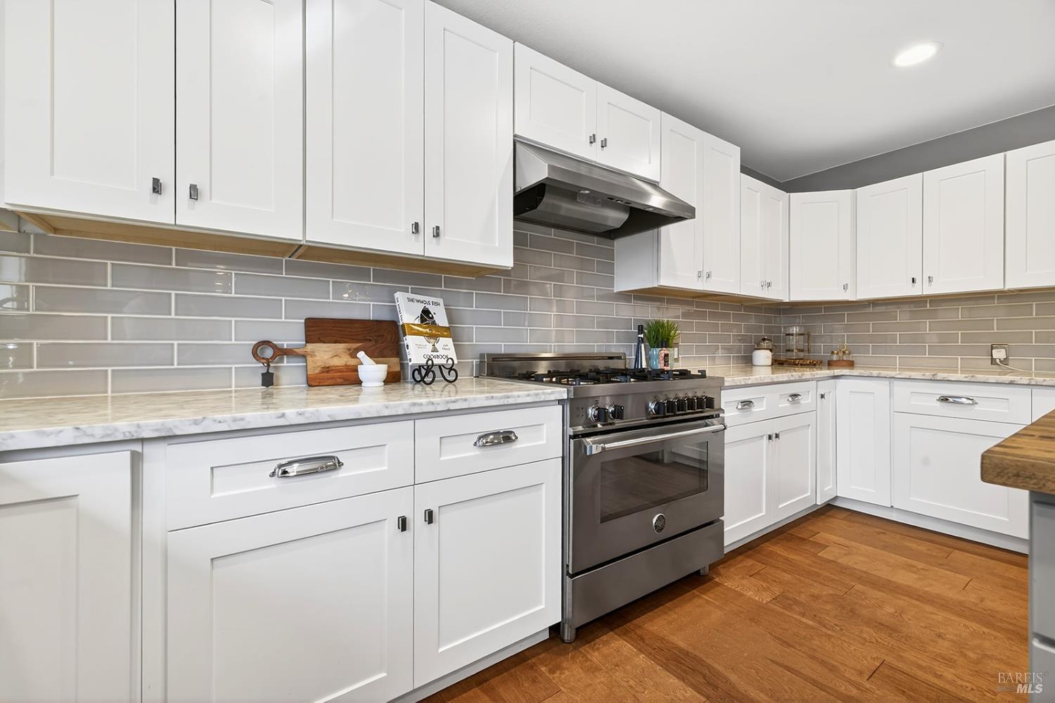 4720 Granada Drive Santa Rosa, CA 95409 - Photo 20 of 68 a kitchen with stainless steel appliances granite countertop a sink a stove and cabinets