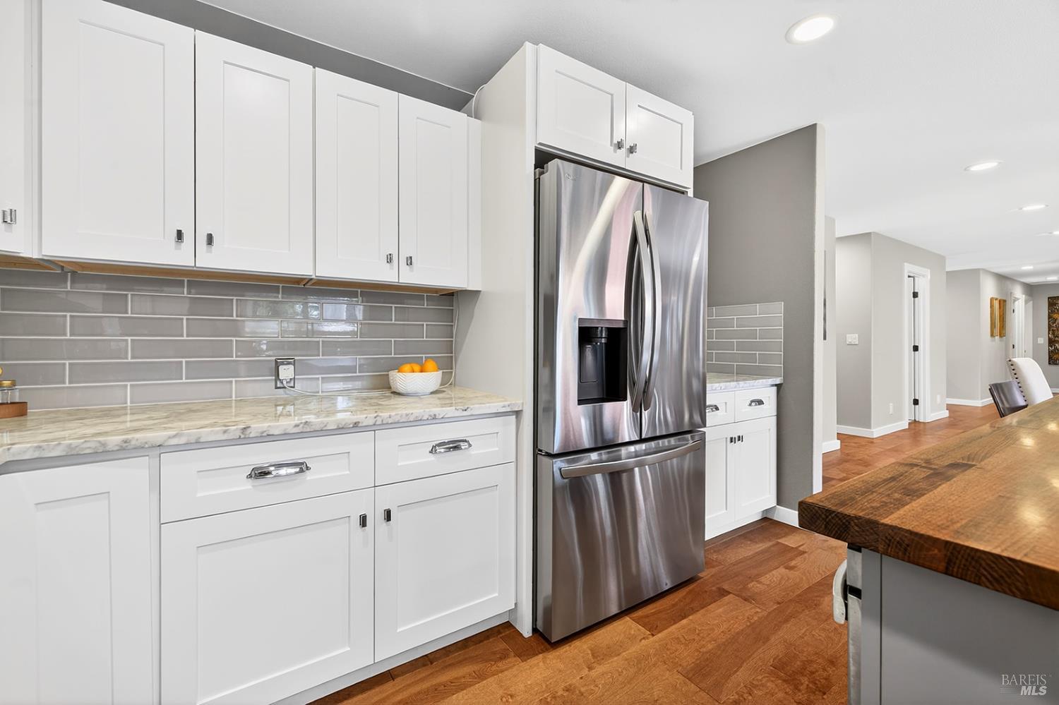 4720 Granada Drive Santa Rosa, CA 95409 - Photo 21 of 68 a kitchen with white cabinets and refrigerator