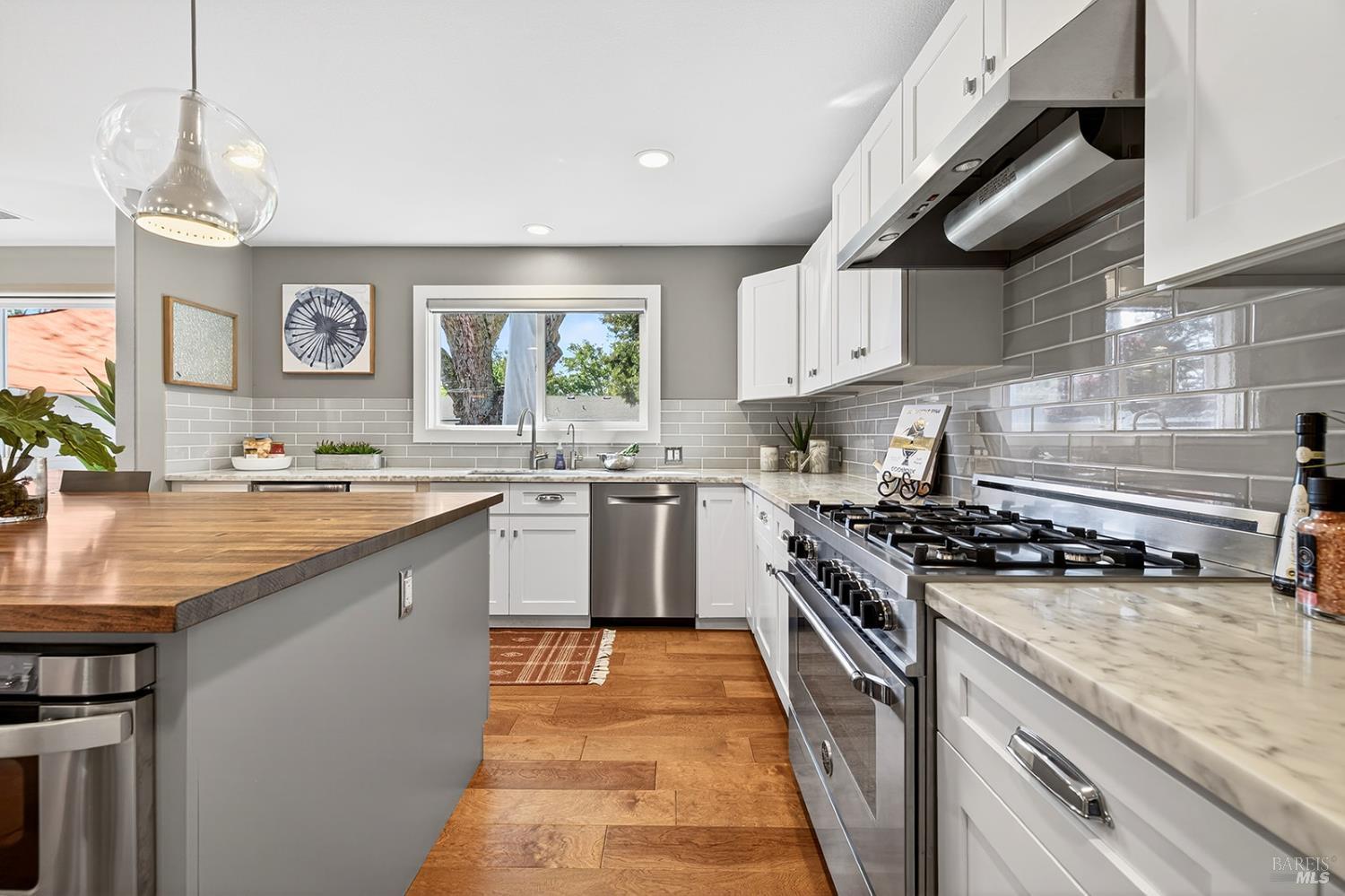 4720 Granada Drive Santa Rosa, CA 95409 - Photo 23 of 68 a kitchen with stainless steel appliances granite countertop a sink a stove and a refrigerator