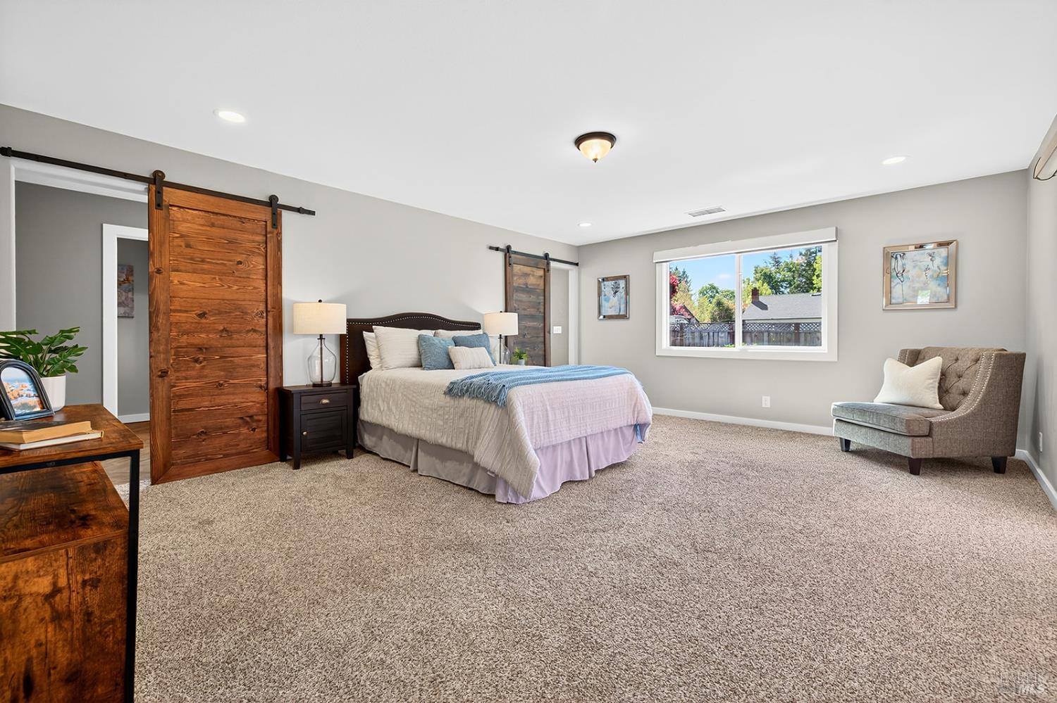 4720 Granada Drive Santa Rosa, CA 95409 - Photo 27 of 68 a spacious bedroom with a bed and window