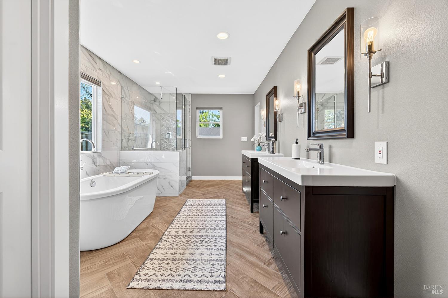 4720 Granada Drive Santa Rosa, CA 95409 - Photo 35 of 68 a spacious bathroom with a tub sink shower and mirror