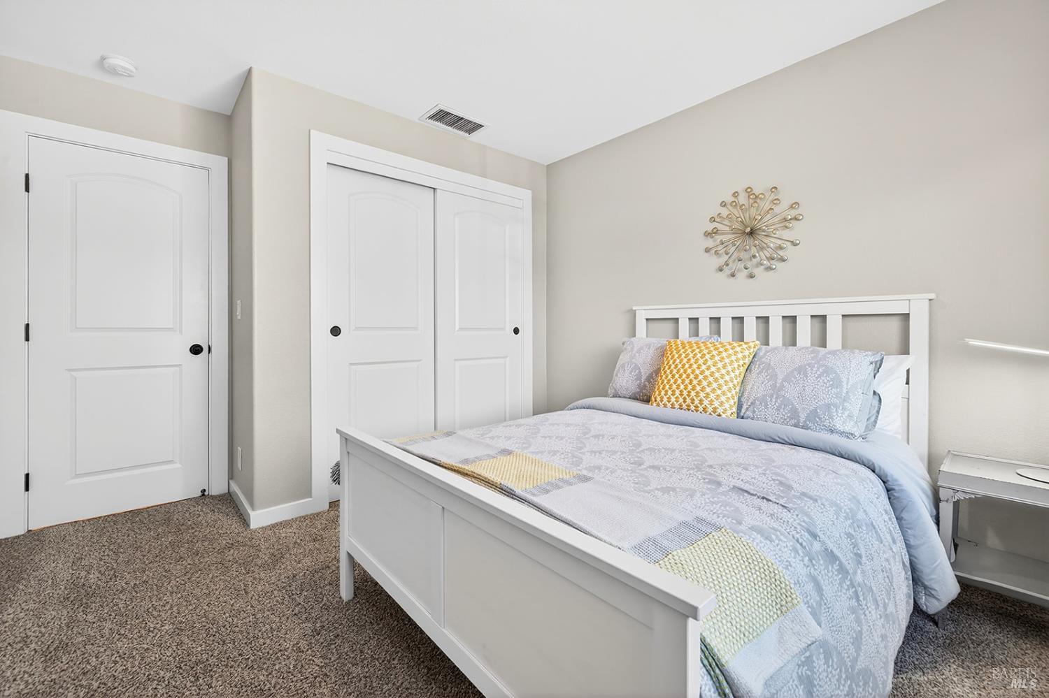 4720 Granada Drive Santa Rosa, CA 95409 - Photo 45 of 68 a bedroom with a bed and a painting on the wall
