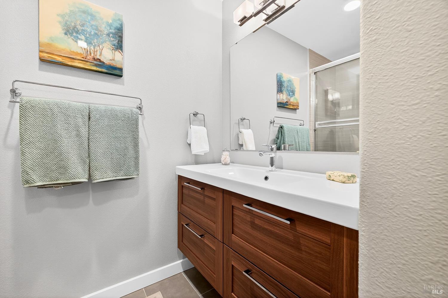 4720 Granada Drive Santa Rosa, CA 95409 - Photo 49 of 68 a bathroom with a sink and a mirror