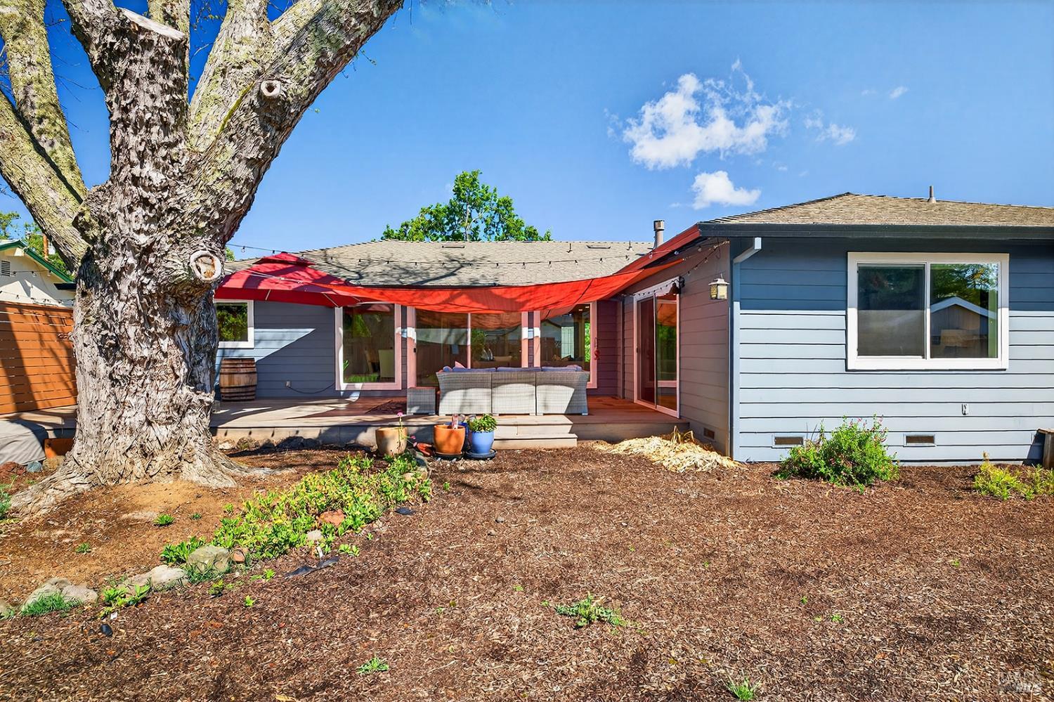 4720 Granada Drive Santa Rosa, CA 95409 - Photo 57 of 68 a view of a house with a porch and a yard