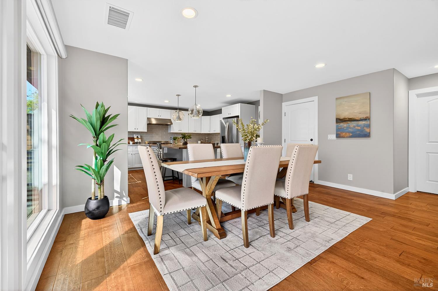 4720 Granada Drive Santa Rosa, CA 95409 - Photo 10 of 68 a dining room with furniture and wooden floor