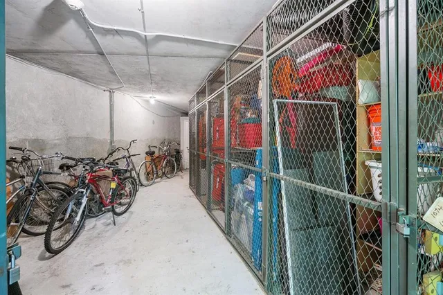 a view of a park with swings and a table