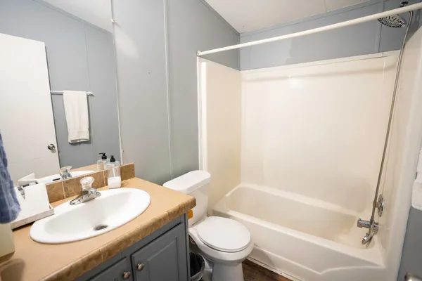 a bathroom with a sink toilet and a bathtub