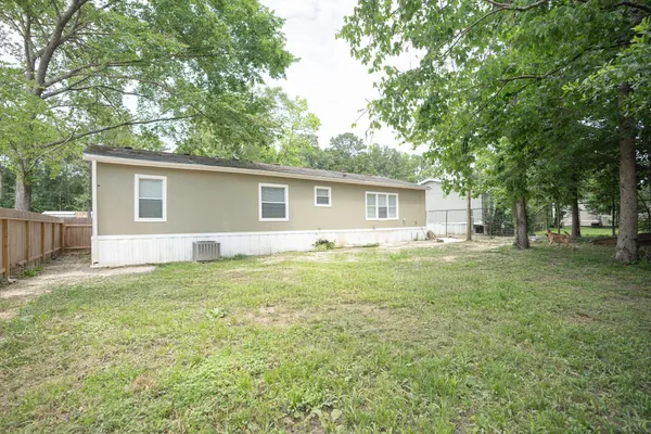 a house view with a backyard space
