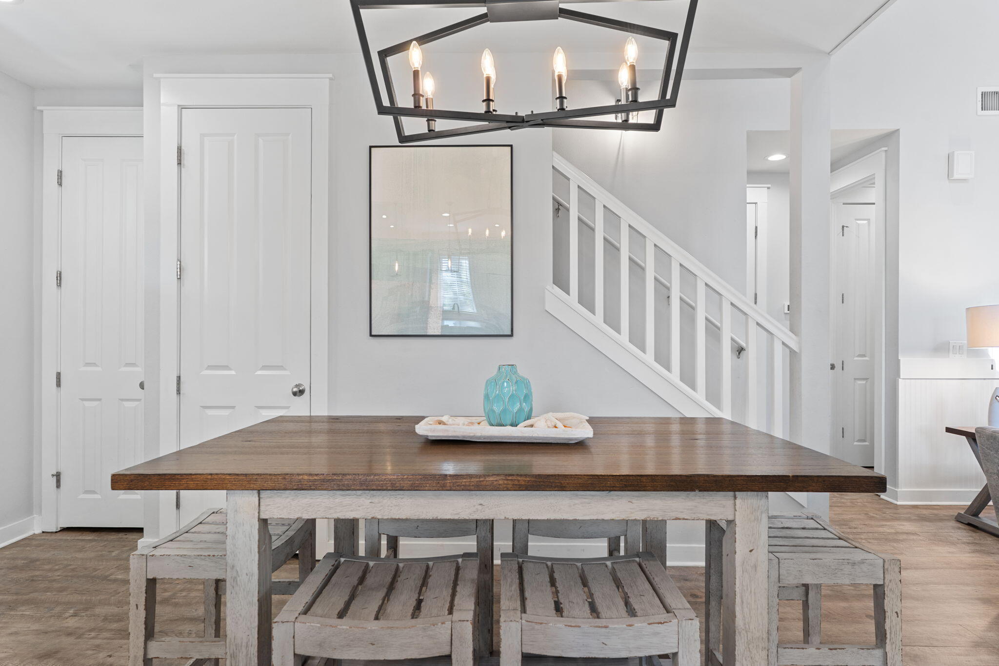 1352 Ravens Run West Miramar Beach, FL 32550 - Photo 19 of 50 a view of a dining room with furniture and wooden floor