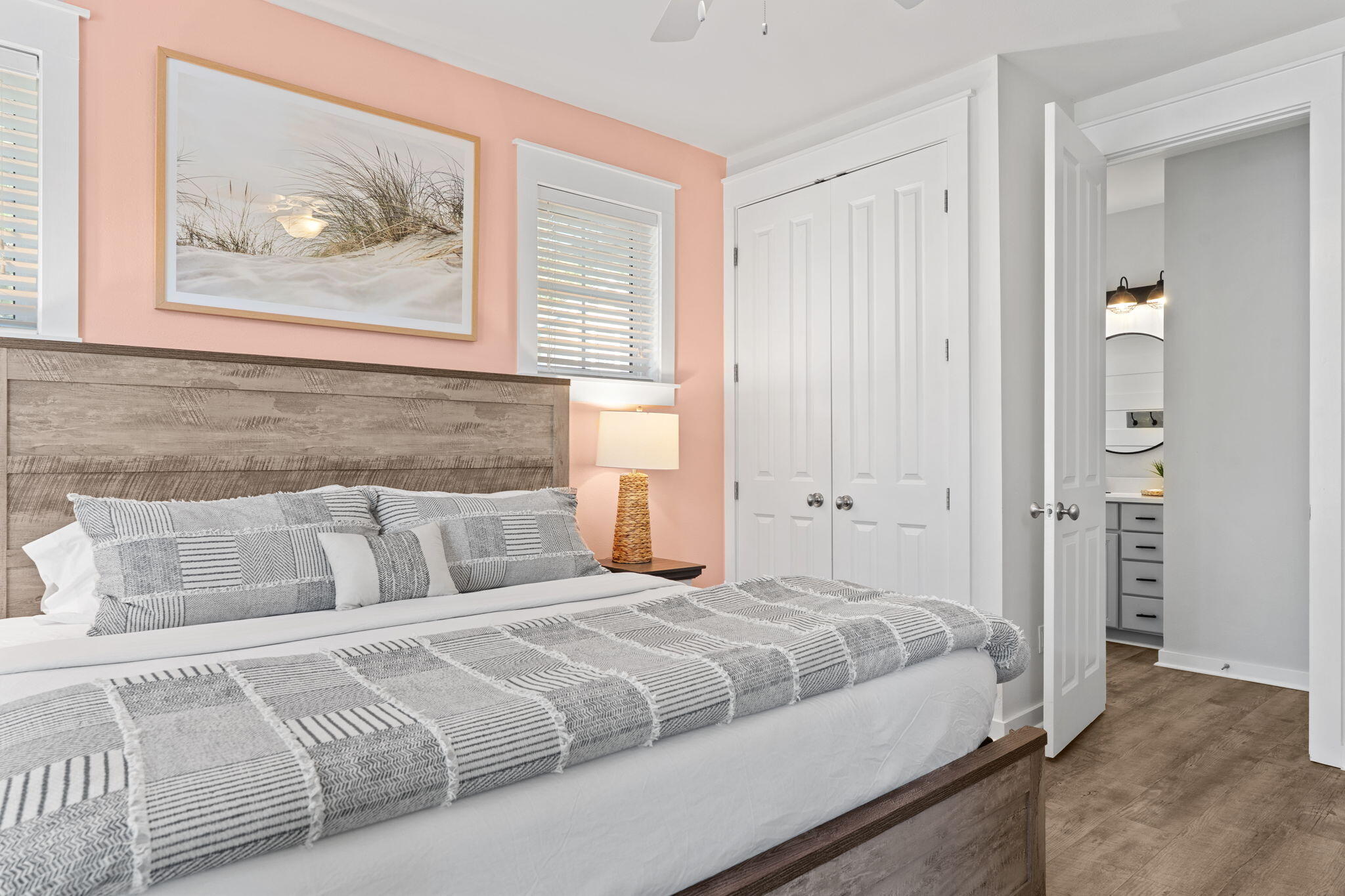 1352 Ravens Run West Miramar Beach, FL 32550 - Photo 30 of 50 a bedroom with a bed and a painting on the wall