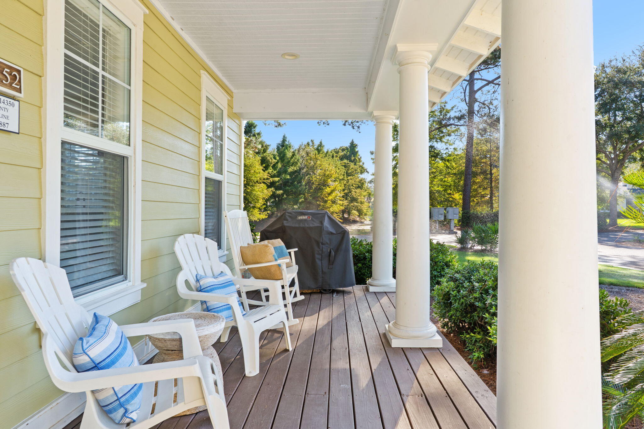 1352 Ravens Run West Miramar Beach, FL 32550 - Photo 3 of 50 a balcony with table and chairs