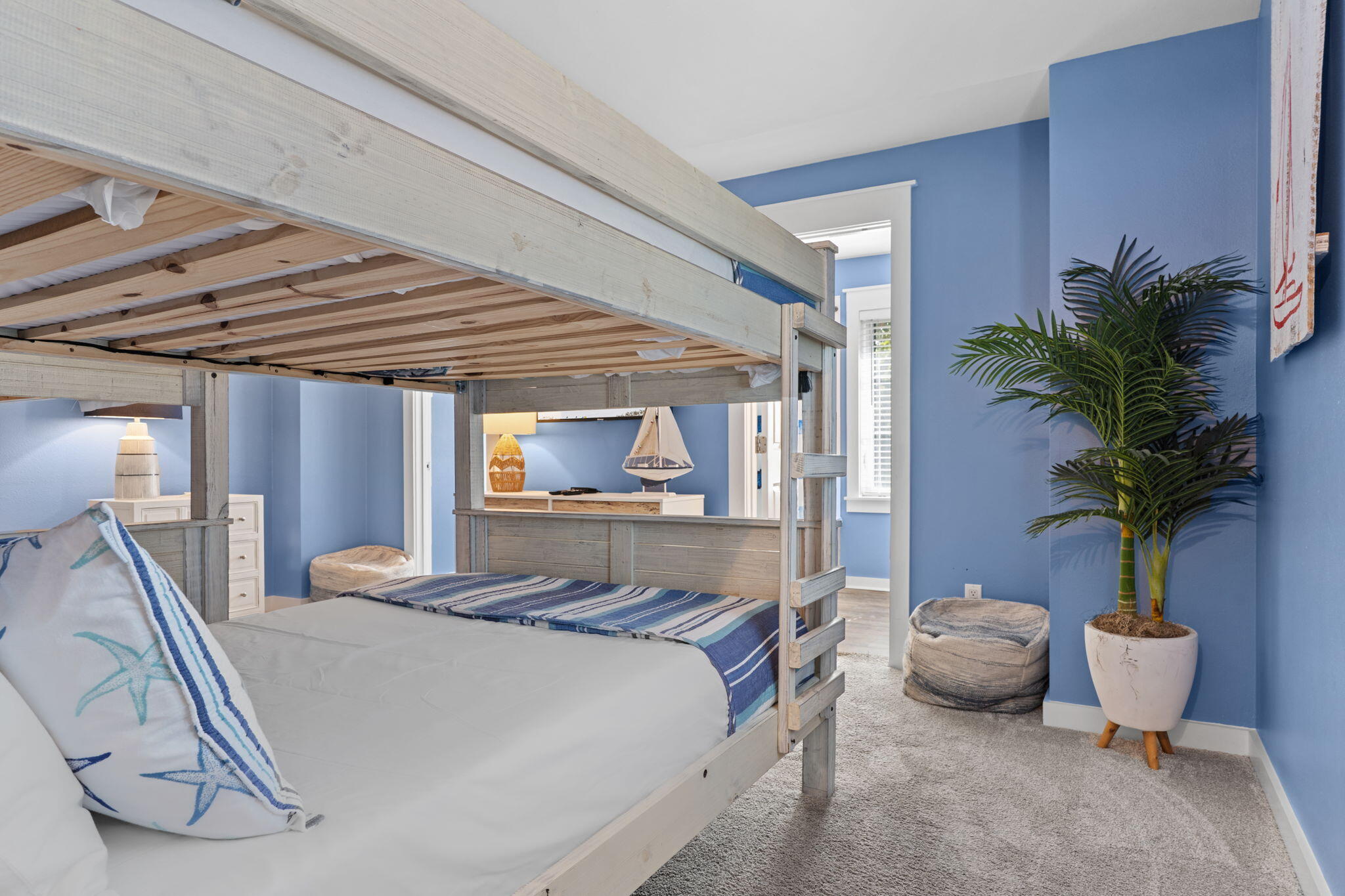 1352 Ravens Run West Miramar Beach, FL 32550 - Photo 34 of 50 a bedroom with bed and a potted plant