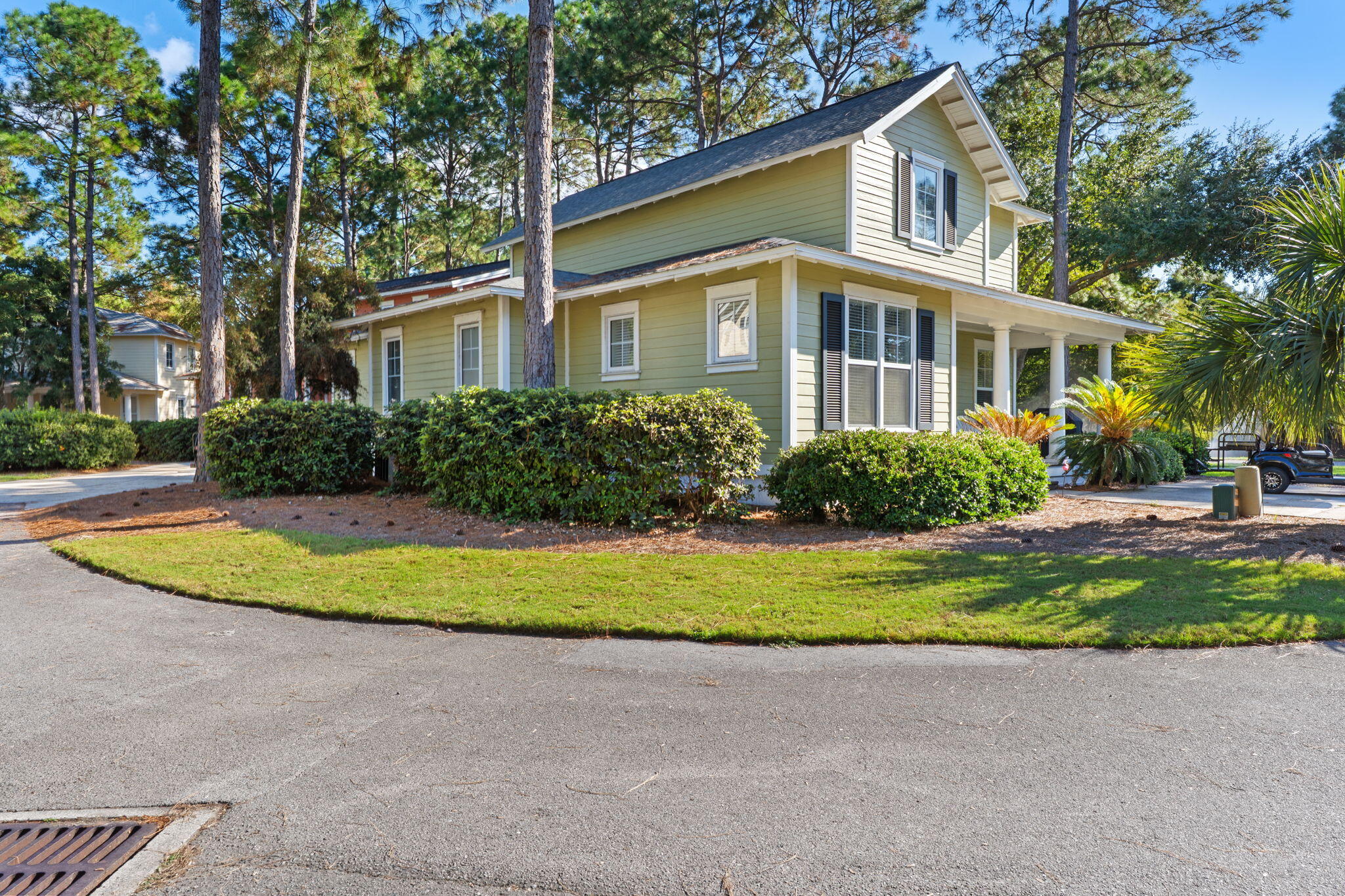 1352 Ravens Run West Miramar Beach, FL 32550 - Photo 44 of 50 a view of a white house with a yard and large trees