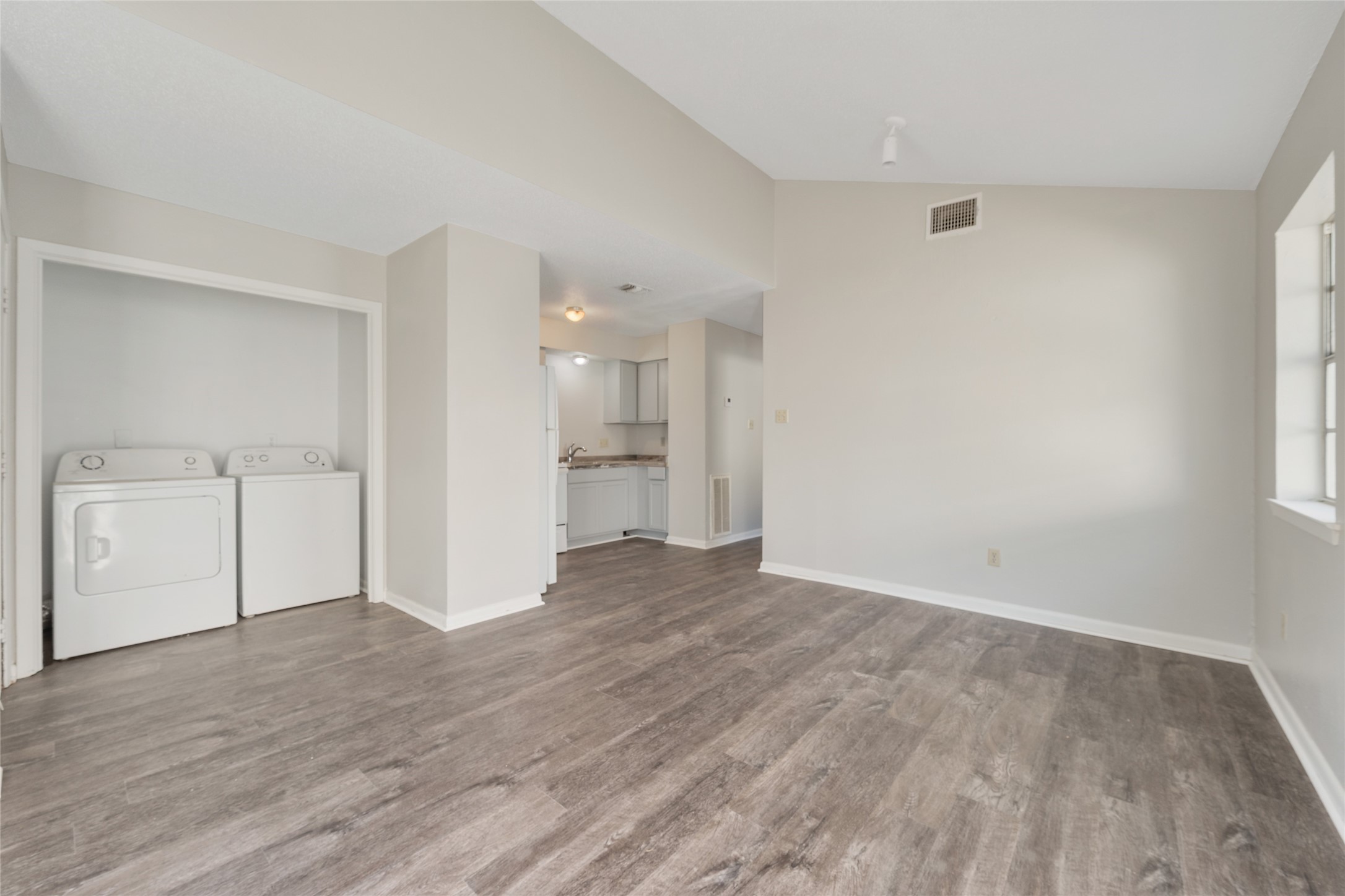 4123 Old Hearne Road Bryan, TX 77803 - Photo 4 of 11 a view of empty room with wooden floor