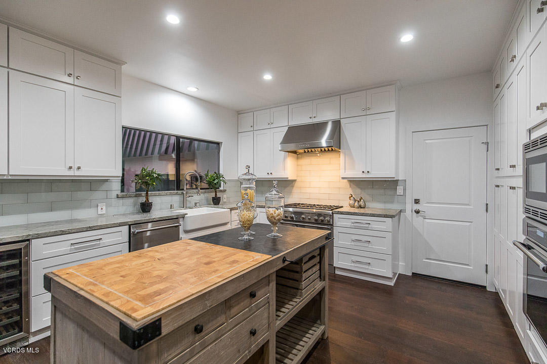 3812 Westfall Drive Encino, CA 91436 - Photo 12 of 52 a kitchen with a stove refrigerator and sink