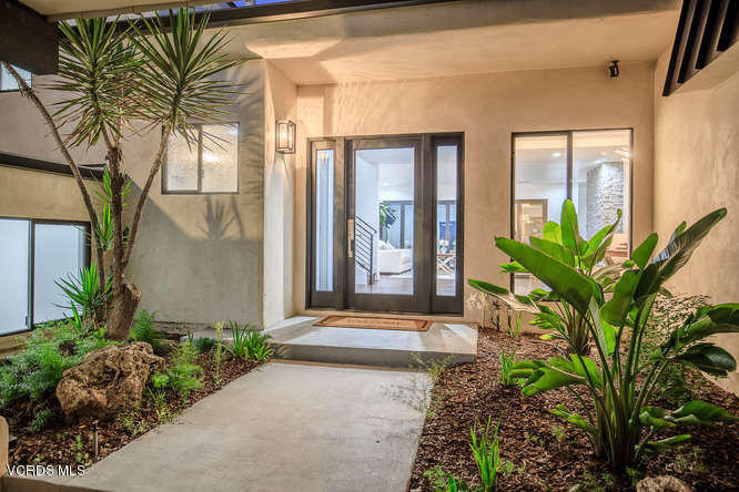 3812 Westfall Drive Encino, CA 91436 - Photo 41 of 52 a front view of a house with a yard