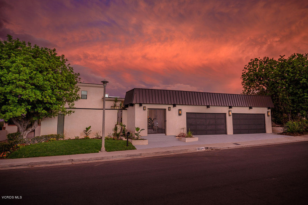 3812 Westfall Drive Encino, CA 91436 - Photo 45 of 52 a view of a house with a street