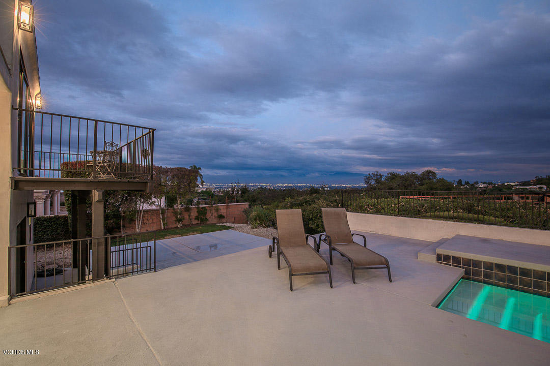 3812 Westfall Drive Encino, CA 91436 - Photo 48 of 52 a view of a terrace with sitting area