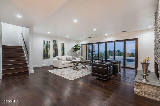 3812 Westfall Drive Encino, CA 91436 - Photo 7 of 52 a living room with furniture and wooden floor