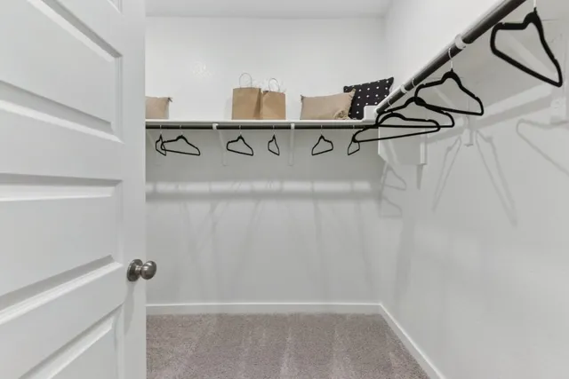 a view of a room with racks on the wall