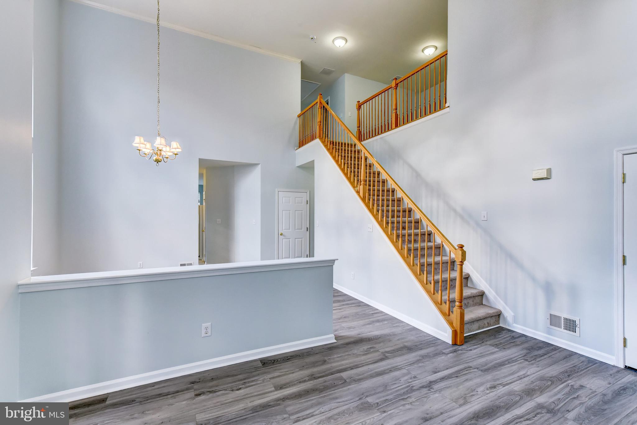 101 Warwick Road Princeton Junction, NJ 08550 - Photo 14 of 39 a view of an entryway with wooden floor