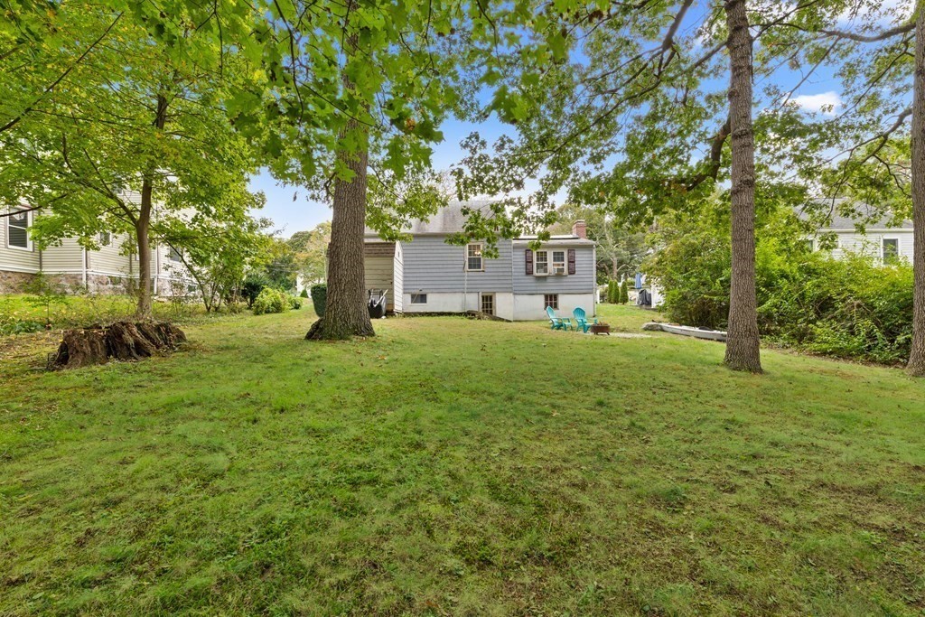 43 Fairview Street Dedham, MA 02026 - Photo 24 of 29 a view of a house with a big yard and large trees