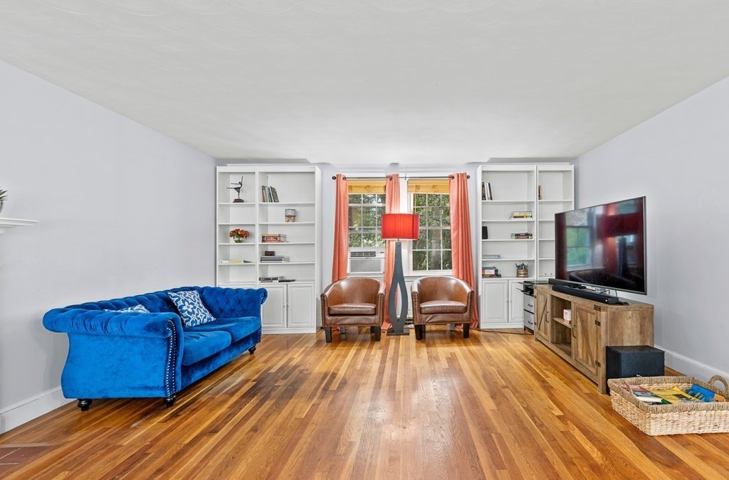 43 Fairview Street Dedham, MA 02026 - Photo 6 of 29 a living room with furniture and a flat screen tv
