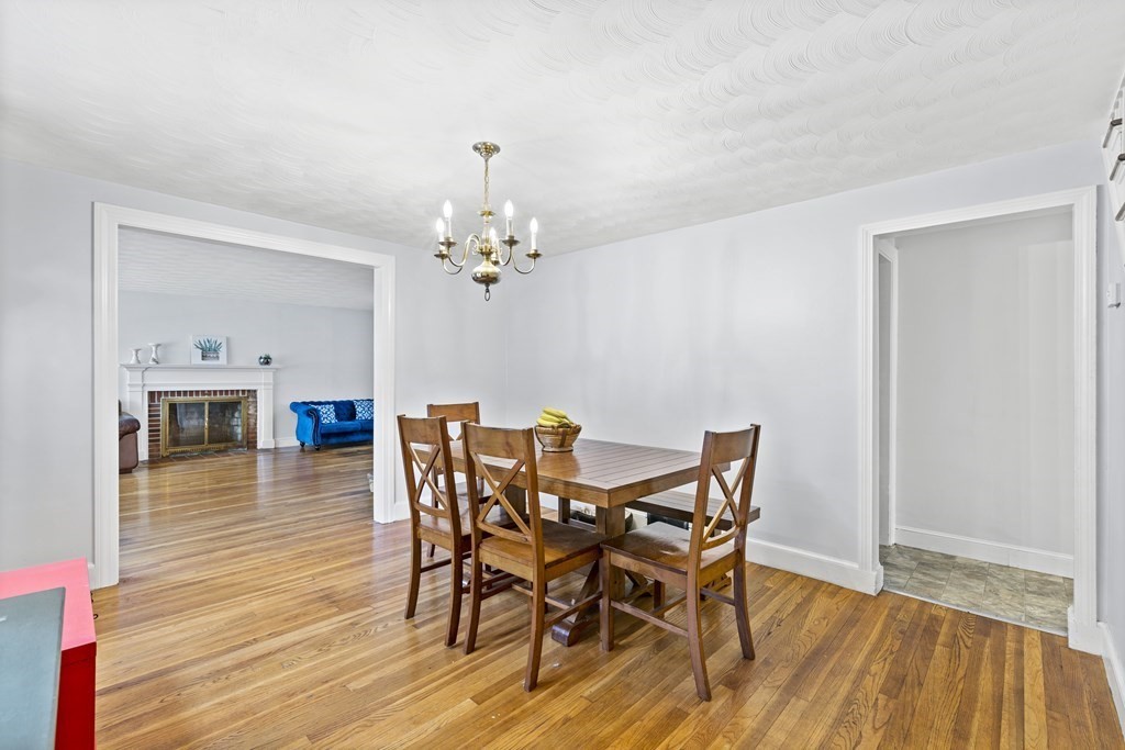43 Fairview Street Dedham, MA 02026 - Photo 9 of 29 a view of a dining room with furniture and wooden floor