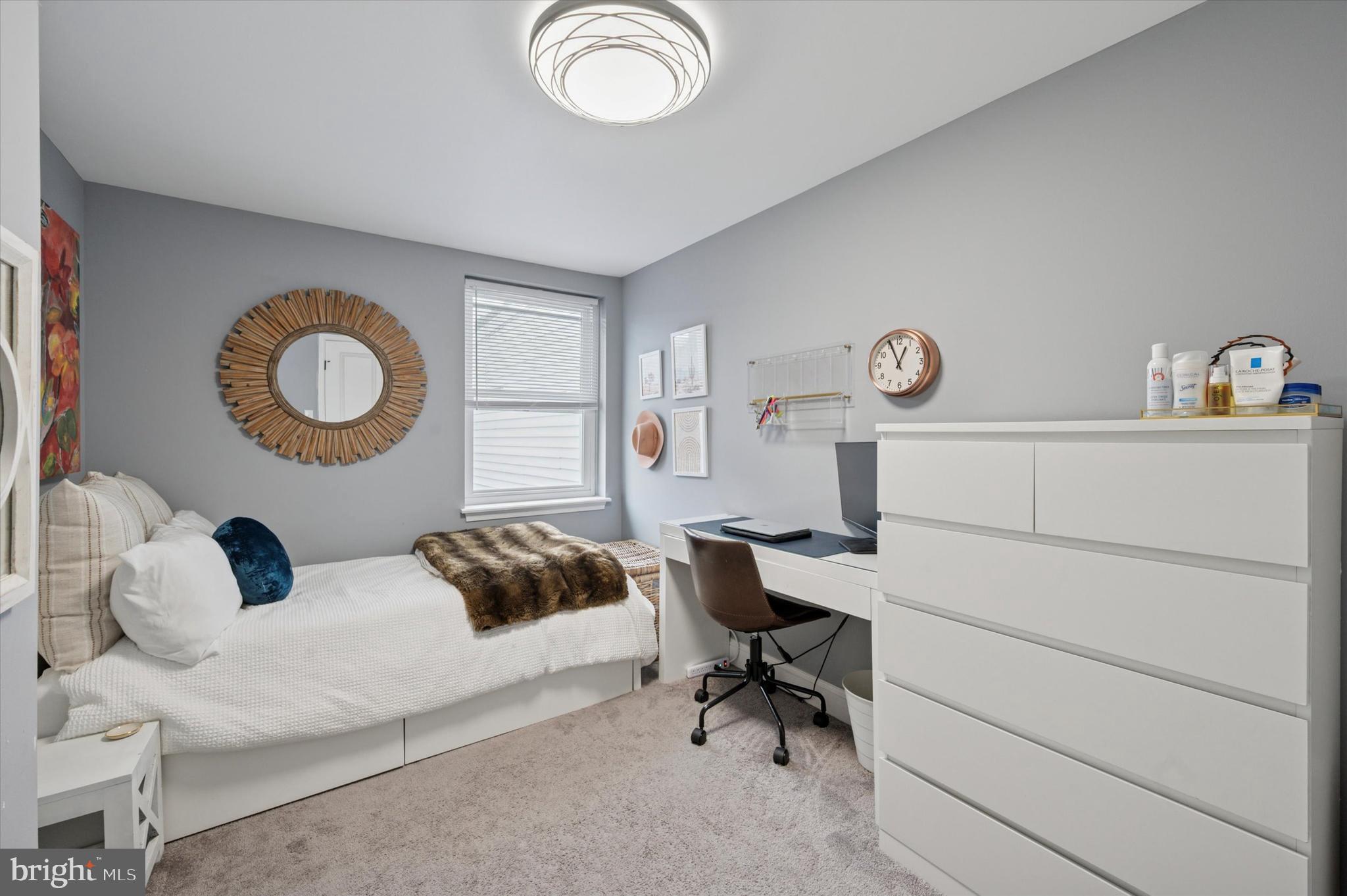 2458 Cedar Street Philadelphia, PA 19125 - Photo 13 of 15 a living room with furniture and a window