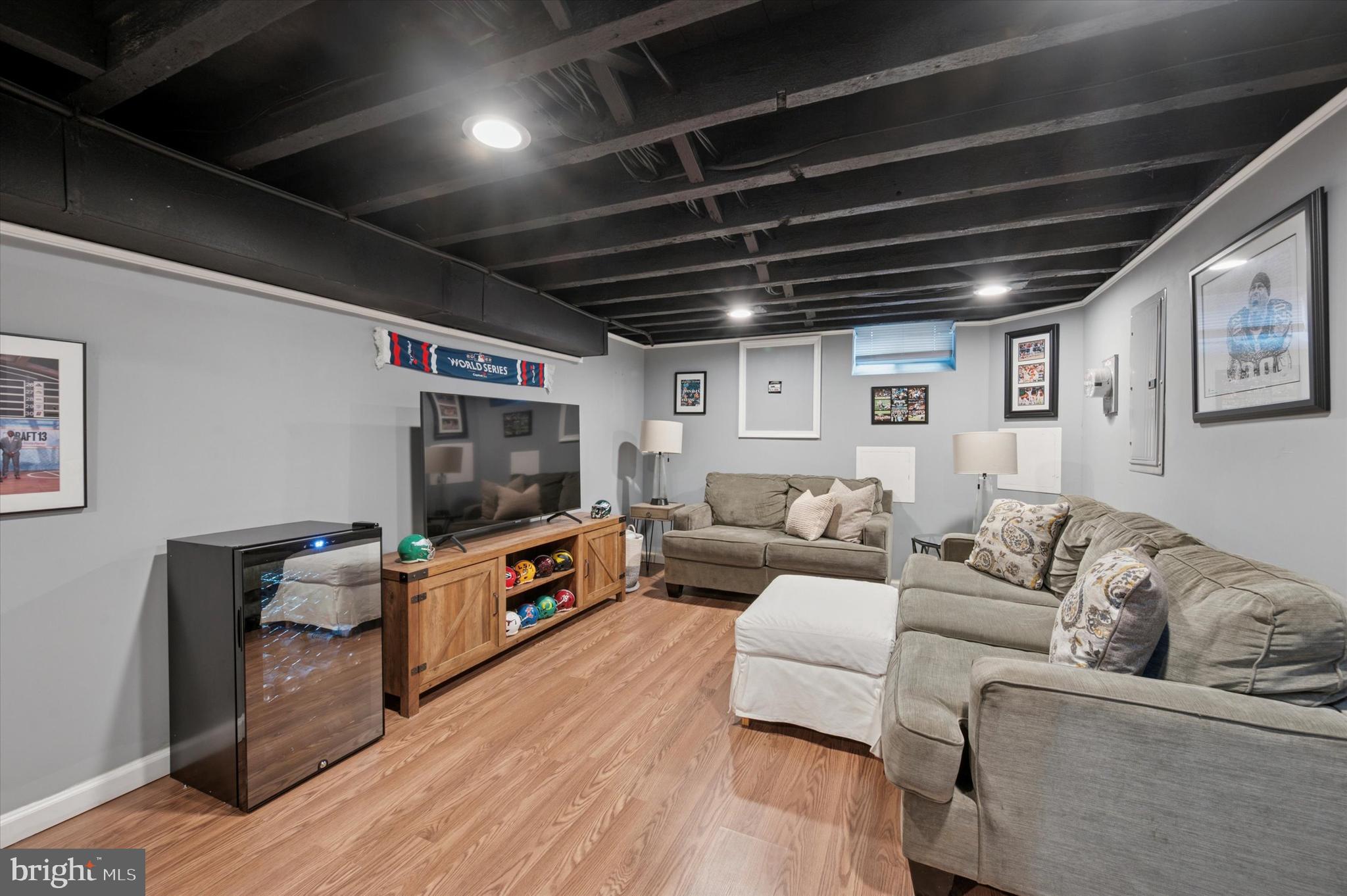 2458 Cedar Street Philadelphia, PA 19125 - Photo 15 of 15 a living room with furniture and a flat screen tv