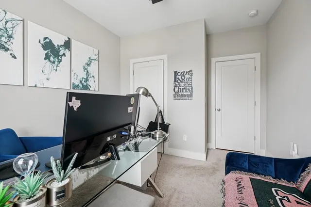 a room with furniture and wooden floor