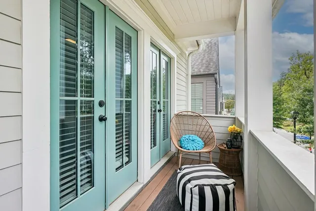 a view of a balcony with chair