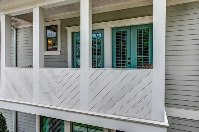 a view of small space in front of house