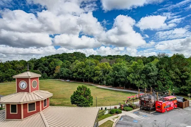 an aerial view of a houses with outdoor space