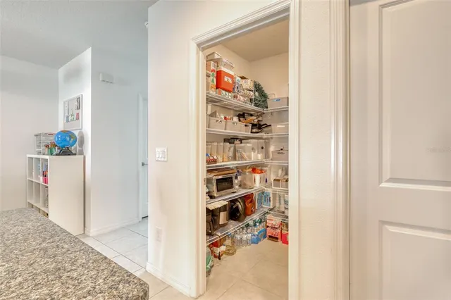 a view of a livingroom with shelves