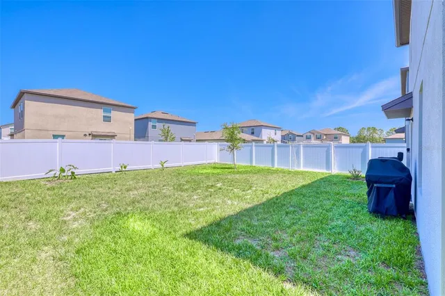 a view of outdoor space and yard